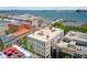 An aerial view showcasing a Charleston, SC neighborhood with waterfront and rooftop features at 1 Vendue Range # I, Charleston, SC 29401