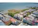 Scenic aerial view showcasing the rooftops and landscaping adjacent to the waterfront at 1 Vendue Range # I, Charleston, SC 29401