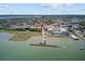 Expansive aerial shot capturing the city skyline and pier extending into the water at 1 Vendue Range # I, Charleston, SC 29401