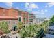 A charming city view with a palm trees and red roofs at 1 Vendue Range # I, Charleston, SC 29401