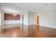 Large living room featuring hardwood floors, a chandelier, and elaborate trim and millwork at 1 Vendue Range # I, Charleston, SC 29401