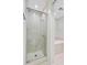 Bathroom featuring a modern tiled walk-in shower with glass door next to tub at 1 Vendue Range # I, Charleston, SC 29401