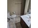 Well-maintained bathroom with tiled floors, a modern sink, and a toilet at 103 Bruce Ct, Summerville, SC 29486