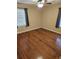 Comfortable bedroom with hardwood floors, neutral paint, and a ceiling fan at 103 Bruce Ct, Summerville, SC 29486