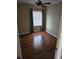 Cozy bedroom with hardwood floors, a window with blinds, and neutral paint at 103 Bruce Ct, Summerville, SC 29486