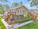 Traditional two-story home with a double deck and landscaped grounds at 107 Jacks Ln, Bonneau, SC 29431