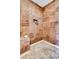 Close up of the tiled walk-in shower featuring mosaic floors and a built-in niche at 107 Jacks Ln, Bonneau, SC 29431
