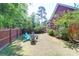 Spacious, fully fenced backyard featuring a fire pit and comfortable seating area at 1126 Rearick Rd, Johns Island, SC 29455