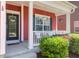 Front porch with welcoming decorations, a welcome door decoration, and chairs at 1126 Rearick Rd, Johns Island, SC 29455