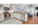 Bright kitchen with white cabinets, granite countertops, and stainless steel appliances at 1126 Rearick Rd, Johns Island, SC 29455