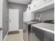 Laundry room with new side-by-side washer and dryer and access to exterior at 1126 Rearick Rd, Johns Island, SC 29455