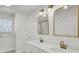 Bright bathroom showcasing a double sink vanity with brass hardware at 117 Red Leaf Blvd, Moncks Corner, SC 29461