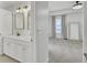 Bathroom view featuring a double sink vanity and entry to bedroom at 117 Red Leaf Blvd, Moncks Corner, SC 29461