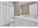 Clean bathroom featuring a vanity with modern fixtures, a toilet, and a shower with a curtain for functional elegance at 117 Red Leaf Blvd, Moncks Corner, SC 29461