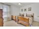 Charming bedroom featuring two twin beds with coordinated decor, complemented by neutral walls and natural light at 117 Red Leaf Blvd, Moncks Corner, SC 29461