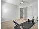 Multi-purpose room featuring exercise equipment, neutral walls, and a closet, offering a versatile space for fitness and storage at 117 Red Leaf Blvd, Moncks Corner, SC 29461