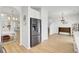 Modern kitchen featuring stainless steel refrigerator, white cabinets, white countertops, and an open floorplan at 117 Red Leaf Blvd, Moncks Corner, SC 29461
