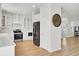 Bright kitchen featuring white cabinets, quartz countertops, stainless steel appliances, and hardwood flooring at 117 Red Leaf Blvd, Moncks Corner, SC 29461