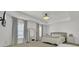 Main bedroom with large windows, tray ceilings, and neutral decor at 117 Red Leaf Blvd, Moncks Corner, SC 29461