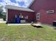 Exterior view of backyard with a generator and air conditioning units at 1297 Segar St, Johns Island, SC 29455