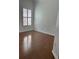 Bright bedroom with hardwood floors and window with shutters at 1297 Segar St, Johns Island, SC 29455