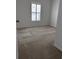 Bedroom featuring carpeted floors and window shutters, offering a bright and airy atmosphere at 1297 Segar St, Johns Island, SC 29455