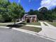 Charming home with well-manicured front yard, long driveway and mature landscaping at 1297 Segar St, Johns Island, SC 29455