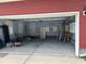 Spacious garage with ample storage, shelving and a washbasin for added convenience at 1297 Segar St, Johns Island, SC 29455