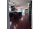 Spacious kitchen with dark cabinets, granite countertops, and a large island for meal preparation at 1297 Segar St, Johns Island, SC 29455