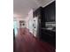Modern kitchen offering stainless steel appliances, dark cabinets, and ample countertop space at 1297 Segar St, Johns Island, SC 29455
