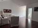Bright living room featuring hardwood floors and an open doorway, creating a flow at 1297 Segar St, Johns Island, SC 29455