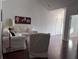 Bright living room with hardwood floors featuring neutral tones and natural lighting throughout at 1297 Segar St, Johns Island, SC 29455