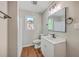 Well-lit bathroom with modern vanity, toilet, and a combined shower/tub at 131 Ponderosa Dr, Ladson, SC 29456