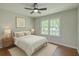 Comfortable bedroom featuring a bed, large windows, and neutral décor at 131 Ponderosa Dr, Ladson, SC 29456
