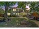 Enjoyable backyard featuring a covered patio, spacious lawn, and playset with a slide at 1337 Horseshoe Bnd, Mount Pleasant, SC 29464