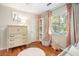 Well-decorated bedroom with a plush rug, window, chest of drawers, and toy at 1337 Horseshoe Bnd, Mount Pleasant, SC 29464