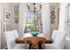 Cozy dining area featuring a chandelier, and bright windows with beautiful natural lighting at 1337 Horseshoe Bnd, Mount Pleasant, SC 29464