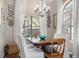 Cozy dining area featuring a chandelier, and bright windows with beautiful natural lighting at 1337 Horseshoe Bnd, Mount Pleasant, SC 29464