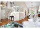 Inviting living room with hardwood floors, staircase, and natural light, offering a comfortable and stylish living space at 1337 Horseshoe Bnd, Mount Pleasant, SC 29464