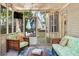 Cozy screened-in porch offers a peaceful outdoor living space with comfortable seating at 1337 Horseshoe Bnd, Mount Pleasant, SC 29464