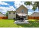 Backyard patio with an outdoor grill and a large shade umbrella, ideal for entertaining at 139 Spindle Way, Goose Creek, SC 29445