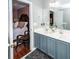 Bathroom view into the bedroom featuring double vanity, neutral paint, and an ensuite at 139 Spindle Way, Goose Creek, SC 29445