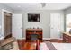 Bedroom featuring a TV on a stand with an electric fireplace, and a recliner at 139 Spindle Way, Goose Creek, SC 29445