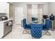 Eat-in kitchen with granite counters, stainless steel appliances, and glass table at 139 Spindle Way, Goose Creek, SC 29445