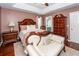 Elegant main bedroom featuring a decorative bedframe, accent furniture, and soft, welcoming colors at 139 Spindle Way, Goose Creek, SC 29445