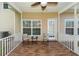 Comfortable screened porch with a brick floor, ceiling fan and outdoor seating at 139 Spindle Way, Goose Creek, SC 29445