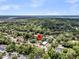 A charming neighborhood nestled among lush greenery is shown from above at 1406 Glencoe Dr, Mount Pleasant, SC 29464