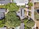 Bird's eye view of a home featuring manicured landscaping and nearby community pools at 1406 Glencoe Dr, Mount Pleasant, SC 29464