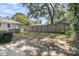 A spacious fenced backyard, perfect for outdoor entertaining or enjoying nature at 1406 Glencoe Dr, Mount Pleasant, SC 29464