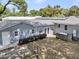 Aerial view showcasing backyard with patio, privacy fence, and ample outdoor space at 1406 Glencoe Dr, Mount Pleasant, SC 29464